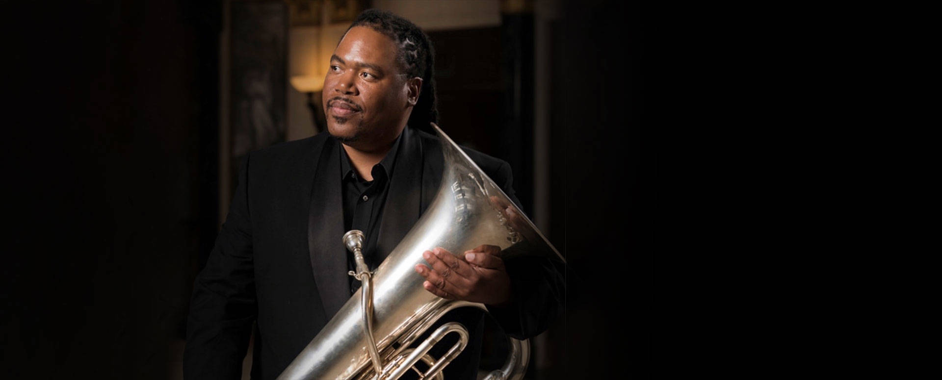 Musician reveals how playing tuba took him from streets to symphony stage