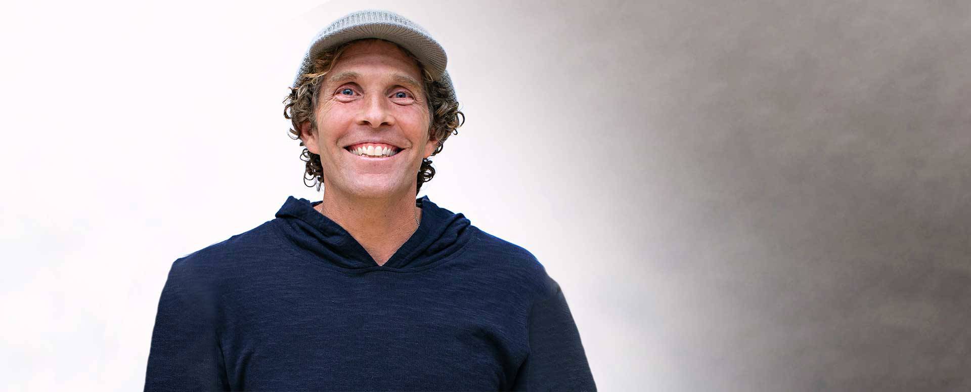 Jesse Itzler, Co-founder of Marquis Jet, and Jay-Z (R) smile and